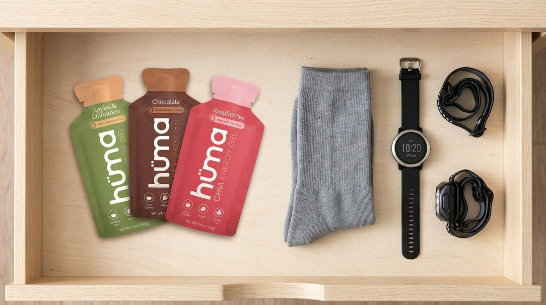 Gear drawer with three Huma gels, running socks, and a watch