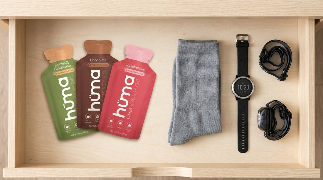 Gear drawer with three Huma gels, running socks, and a watch